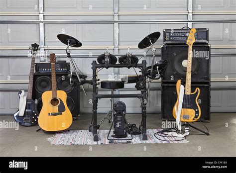 Rock band equipment in a suburban garage Stock Photo - Alamy