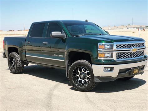 My 2014 rainforest green Chevy Silverado. I was told that only 8,000 ...