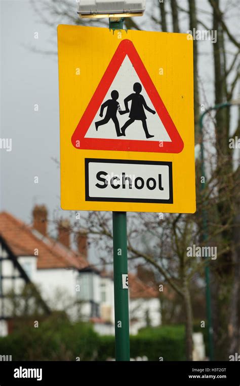 School ahead warning road sign Stock Photo - Alamy