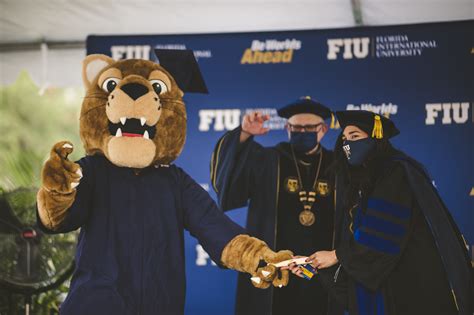 FIU graduates celebrate real triumphs at first in-person commencement ...