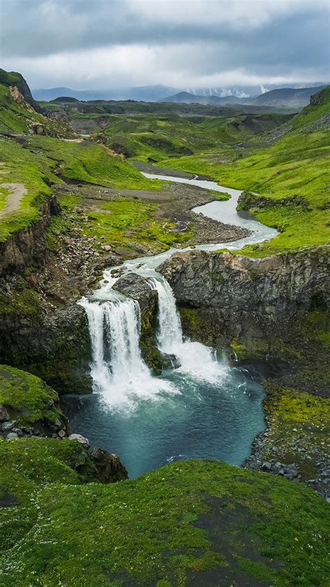 Waterfall at the gates of Okmok at Umnak, Aleutian Islands, Alaska, USA ...