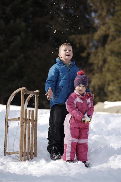 Brother and sister portrait in winter time 11613329 Stock Photo at Vecteezy