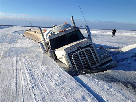 Heavy fuel truck crashes through ice road days after government raises ...