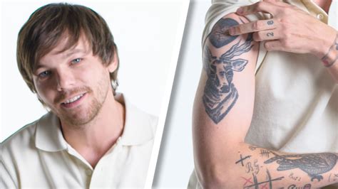 Watch Louis Tomlinson Breaks Down His Tattoos | Tattoo Tour | GQ