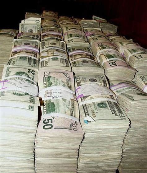 stacks of cash | MyConfinedSpace