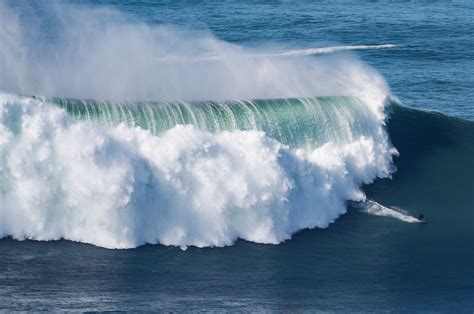 Hurricane-generated swell draws big wave surfers to Portugal's Nazare ...