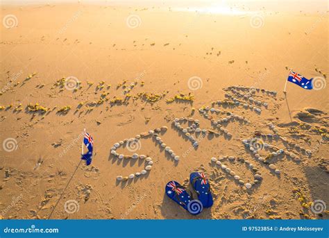 Straya Text, Flag and Thongs on Beach Stock Photo - Image of coast ...