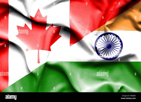 Waving flag of India and Canada Stock Photo - Alamy