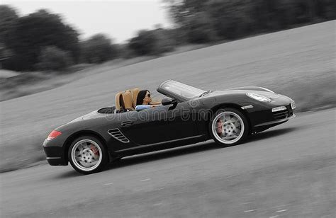 Woman driving sports car editorial image. Image of panned - 54898450