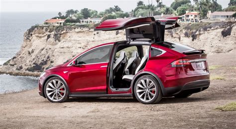 Tesla Model X falcon wing doors use ultrasonic sensors to operate in ...