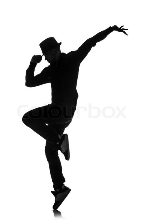 Get this hi-res stock photo Silhouette of male dancer isolated on white ...