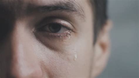 Close up of Crying man with tears in eye in slow motion — Stock Video ...