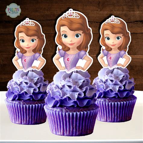 three purple cupcakes with princesses on them