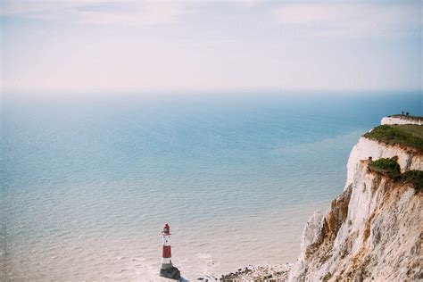 "Lighthouse Beneath White Cliffs" by Stocksy Contributor "Kitty Kleyn ...