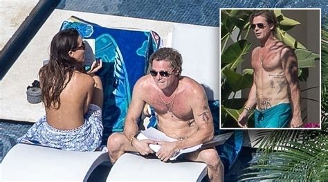 Brad Pitt sunbathes with topless girlfriend Ines de Ramon in Mexico ...