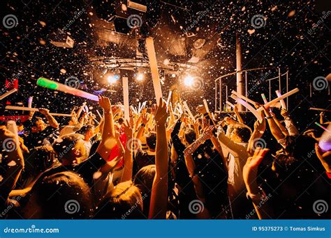 Nightclub crowd dancing editorial stock photo. Image of hand - 95375273