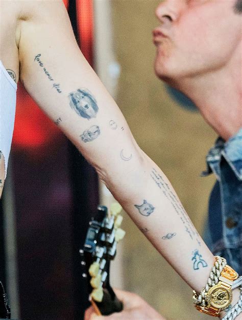 Miley Cyrus' Tattoos: Guide to All Her Ink and Their Meanings