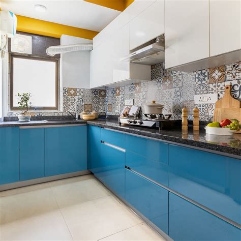 Compact Blue And Brown Kitchen Tile Design | Livspace