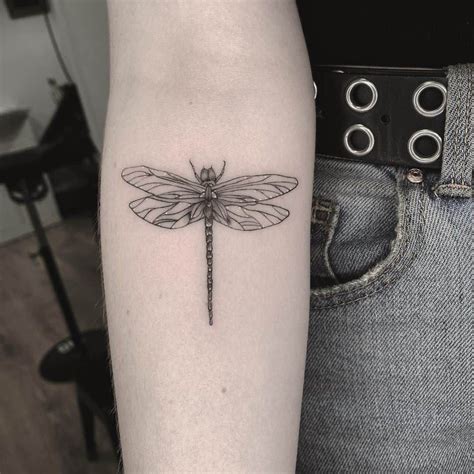 Dragonfly Tattoo On Arm | Dragonfly tattoo design, Dragonfly tattoo ...