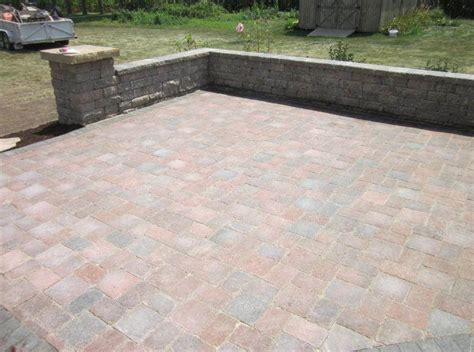 Should I Add a Concrete or Brick Paver Patio? | Designer Landscapes