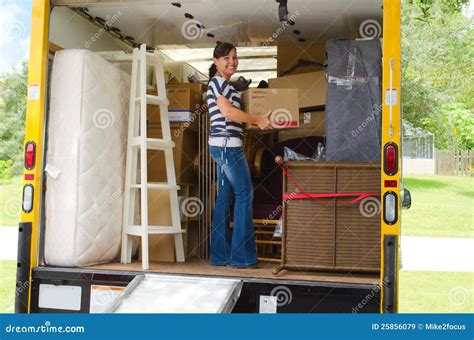 Pretty Woman Loading a Full Moving Truck Stock Image - Image of rental ...