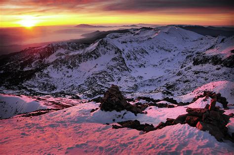 Sunrise Over Snowy Mountains by Maya Karkalicheva