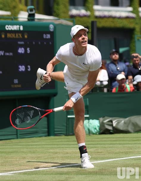 Photo: Denis Shapovalov vs Gregoire Barrere at Wimbledon 2023 ...