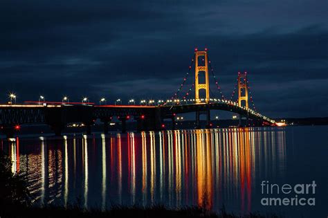 Mackinac Bridge at night Photograph by Martha Dahl