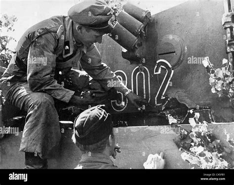 German tank crew observes a hit on its tank Stock Photo - Alamy