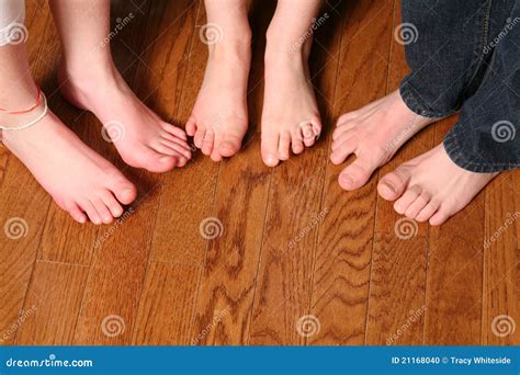 Kids Feet On Wood Floor Stock Photo - Image: 21168040