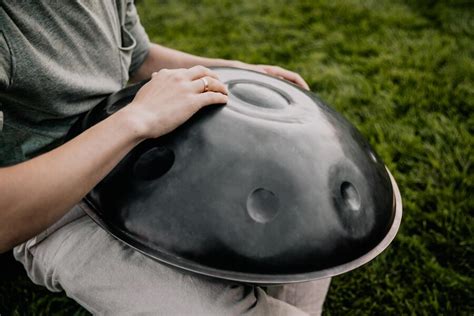 Premium Photo | Close up musician playing handpan