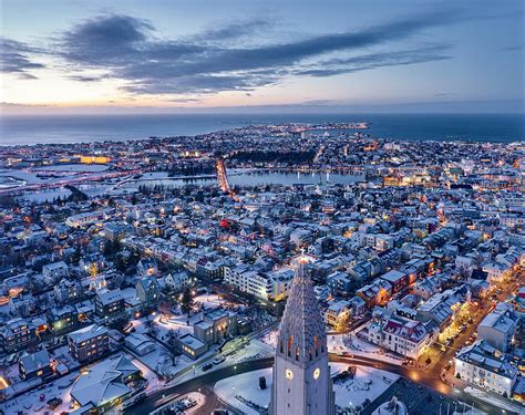 Majestic Drone View Of Reykjavik City Center In Twilight Photograph by ...