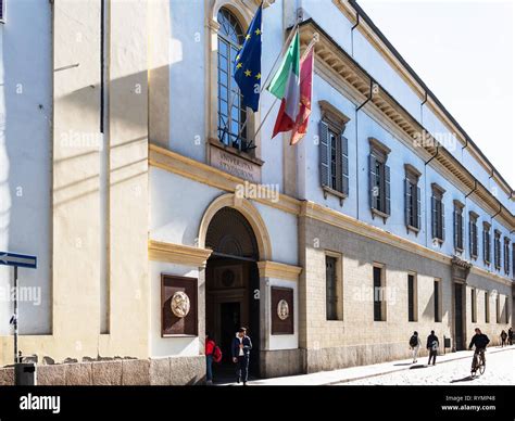 PAVIA, ITALY - FEBRUARY 22, 2019: studens near Central building ...