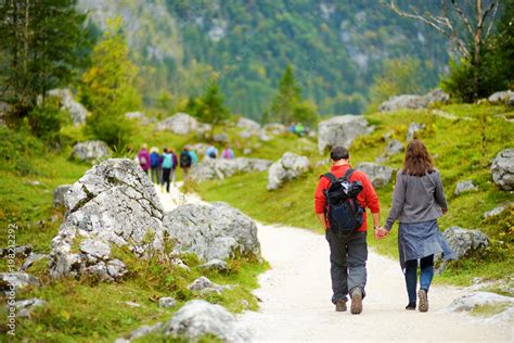 Zdjęcie Stock: Tourists on a hiking trails around picturesque Konigssee ...