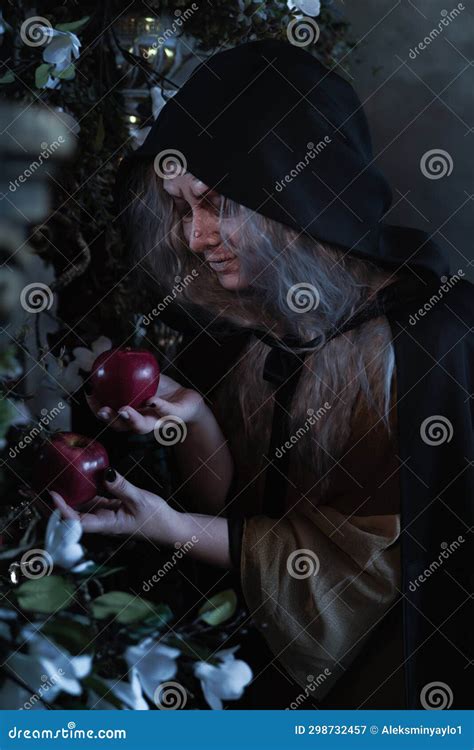 Stepmother Witch Gives Poisoned Red Apple.Woman As Witch in Black ...