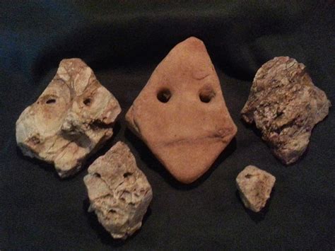 Archaeology of Portable Rock Art: Lower Paleolithic art motif of "faces ...