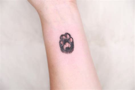 26 Adorable Paw Print Tattoo Ideas for Men & Women in 2023