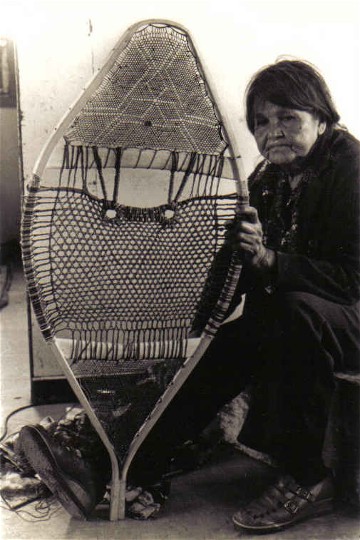 lizabeth holding snowshoe with detailed woven design