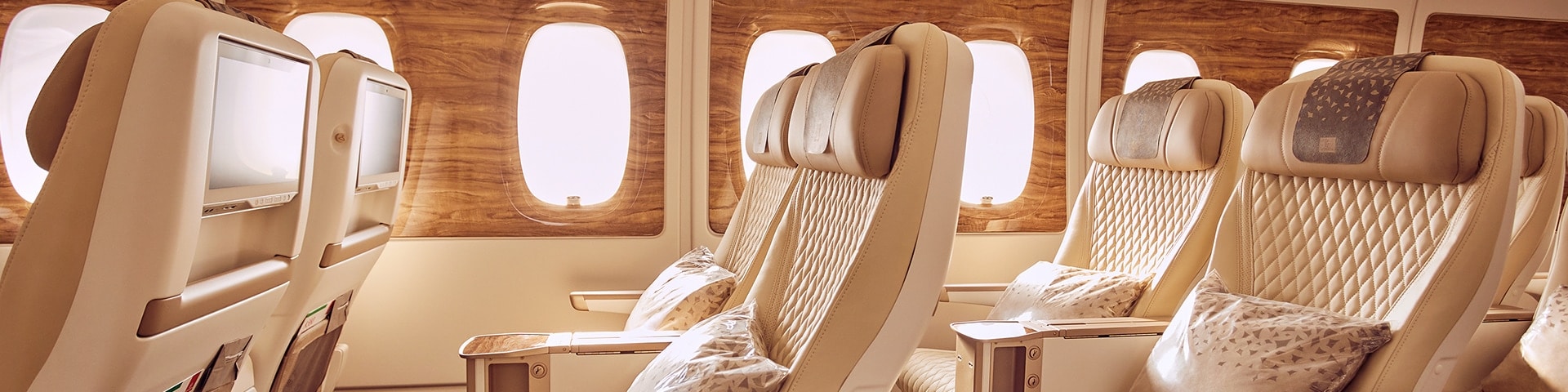 beige and brown a380 seats in premium economy cabin