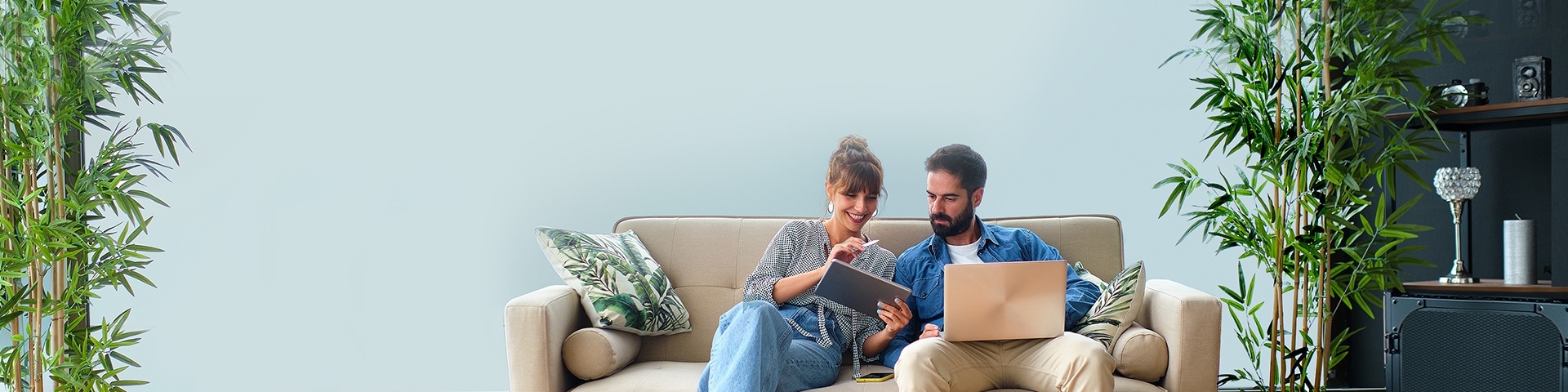 couple spending good time shopping on their couch