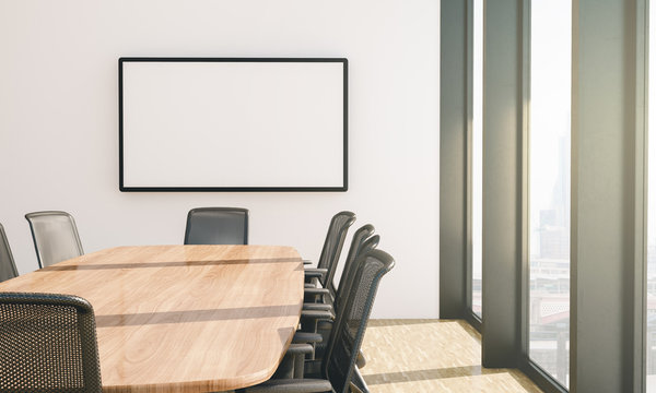 white screen mockup on conference room