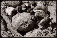 Workers Trying To Move A Huge Stone, Diamond Mines, Sierra Leone