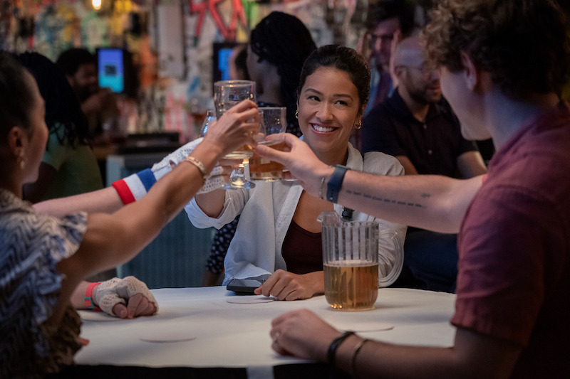 Liza Koshy as Ashley, Gina Rodriguez as Mack, and Augustus Prew as Brannagan in 'Players'