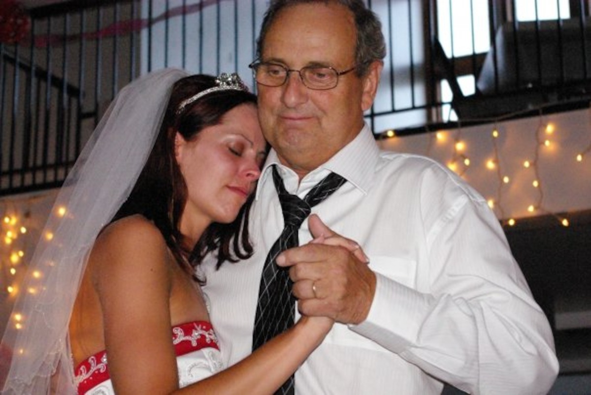 Amanda Antoni at her wedding dancing with her father.