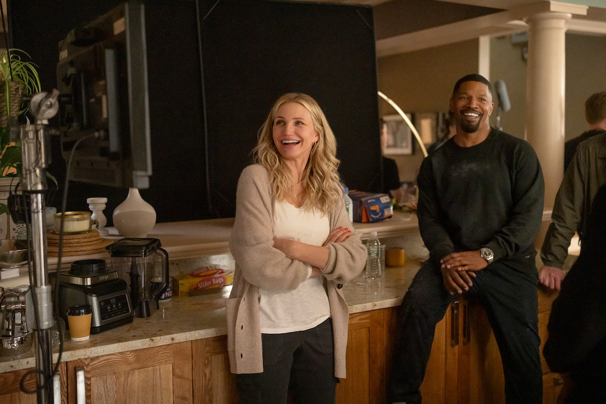 Cameron Diaz as Emily and Jamie Foxx as Matt with crew members on the set of ‘Back In Action.’