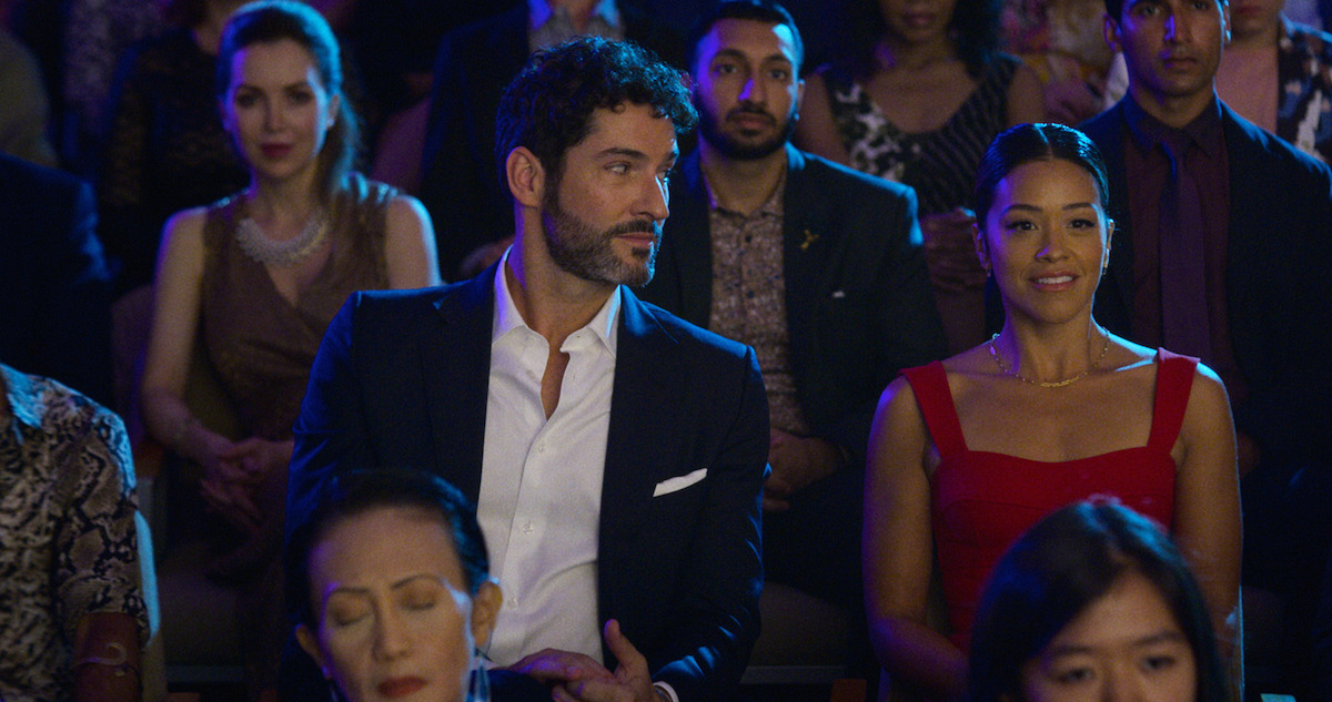 Tom Ellis as Nick and Gina Rodriguez as Mack.