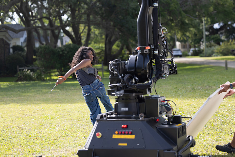 Carlacia Grant in the Outer Banks Season 4 BTS photos.