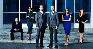 Rick Hoffman as Louis Litt, Gina Torres as Jessica Pearson, Gabriel Macht as Harvey Specter, Patrick J. Adams as Mike Ross, Meghan Markle as Rachel Zane, Sarah Rafferty as Donna Paulsen in Suits.