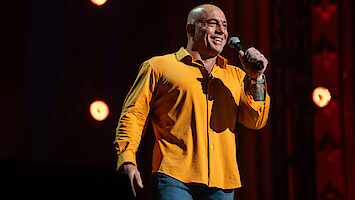 Joe Rogan performing during his 'Joe Rogan: Burn the Boats' special.