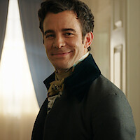 Luke Thompson as Benedict Bridgerton smiles in Season 3 of 'Bridgerton'